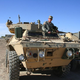 Illustration for article titled The M1117 Guardian: When A Hummer Makes Love To A Tank